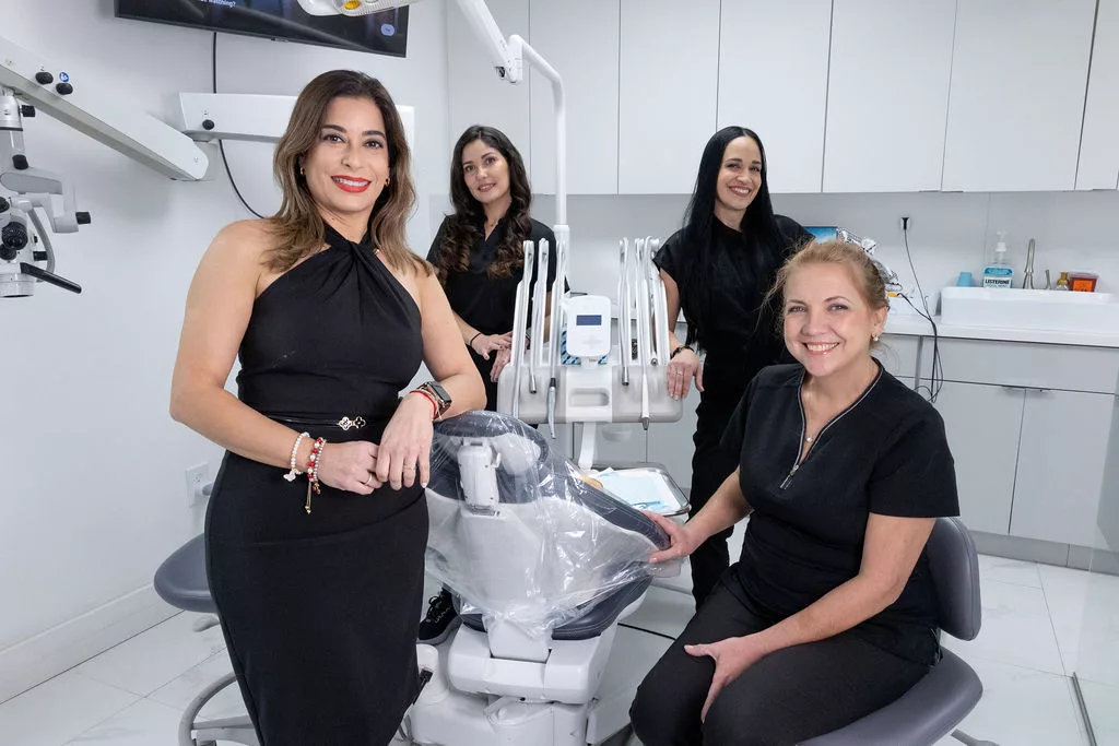Patient with ceramic braces at Dr. G Dental Studio Miami